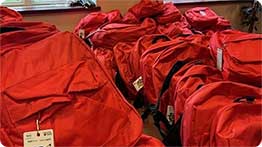 photo of red backpacks